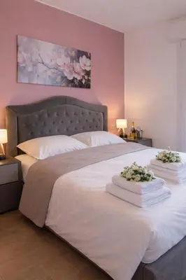 Letto o letti in una camera di Casa Tintoretto Private Free Parking Venice 15'