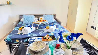 Letto o letti in una camera di Ca’ Marea by Ca-Sa Check
