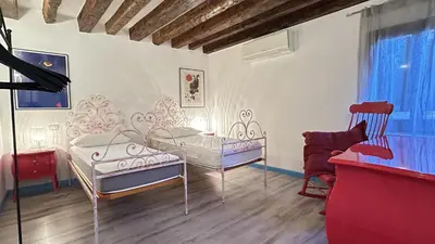 Letto o letti in una camera di Corte Torretta