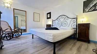 Letto o letti in una camera di Corte Torretta
