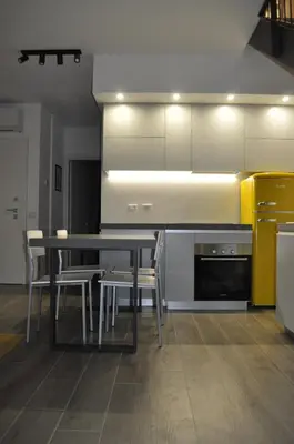 Cucina o angolo cottura di Giardino di Lei, appartamento Giallo