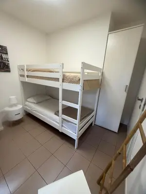 Letto o letti in una camera di Spacious apartment near the beach