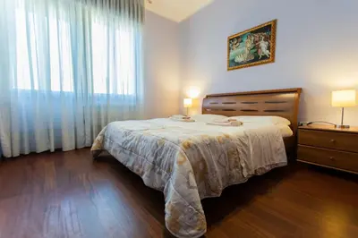 Letto o letti in una camera di Cà Milla