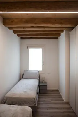 Letto o letti in una camera di Vicenza Green Stay Melograno