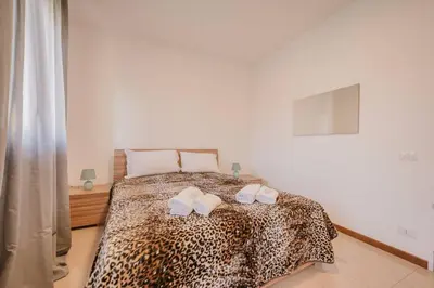 Letto o letti in una camera di Unico Apt 3B, 2 ospiti, Parcheggio gratis, 10 minuti da Venezia