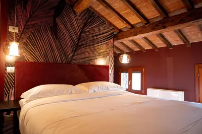 Letto o letti in una camera di Palazzo delle Tre Lune Apartments