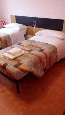 Letto o letti in una camera di Locanda da Lucia