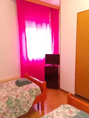 Letto o letti in una camera di Locanda da Lucia