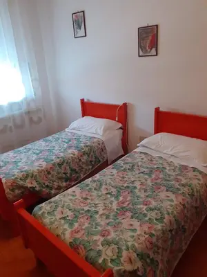 Letto o letti in una camera di Locanda da Lucia