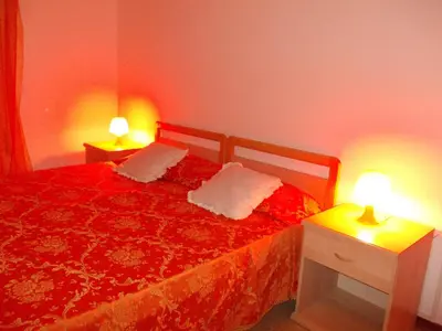 Letto o letti in una camera di Travellers Lodge Bed & Rooms