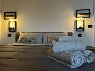 Letto o letti in una camera di Modern apartment, terrace, AC and WiFi