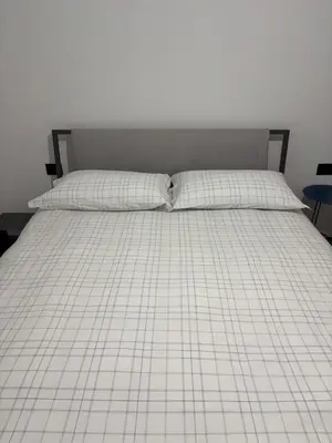 Letto o letti in una camera di Agapè