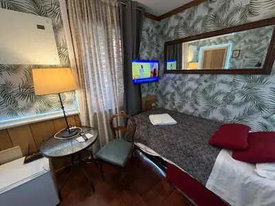 Letto o letti in una camera di Just for Single Exclusive Lionsclass
