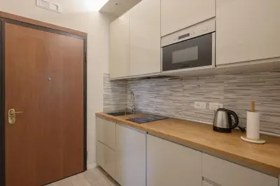 Cucina o angolo cottura di GuestHost - Cozy Apt near Basilica Sant'Antonio