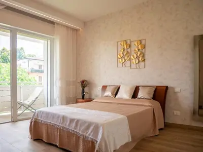 Letto o letti in una camera di Villa Butterfly