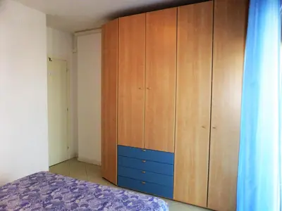 Letto o letti in una camera di Residence Aurora Park zona Piazza Aurora