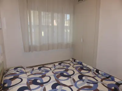 Letto o letti in una camera di VILLA MARINA 3 CAMERE 2 BAGNI solo per famiglie PIAZZA NEMBER