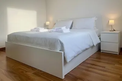 Letto o letti in una camera di 999-Ting
