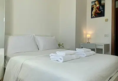 Letto o letti in una camera di 999-Ting
