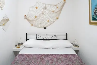 Letto o letti in una camera di Casa Gioia