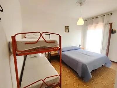Letto o letti in una camera di Villa Armida