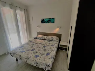 Letto o letti in una camera di Villa Bungalow 2