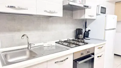 Cucina o angolo cottura di Sweet Apartment by Ca-Sa Check