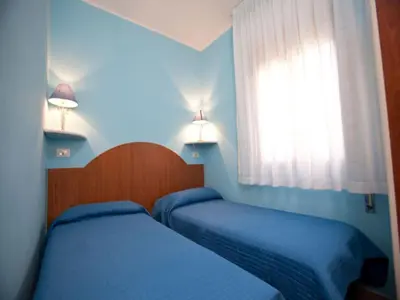 Letto o letti in una camera di Modern flat just 150 mt from the sea