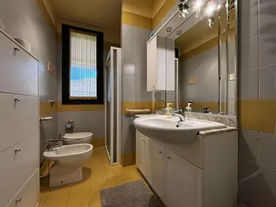 Bagno di Bright apartment with pool near the sea