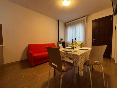Area soggiorno di Cozy apartment in the heart of the pinewood