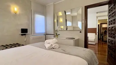 Letto o letti in una camera di Le Masque Terrace Prestige