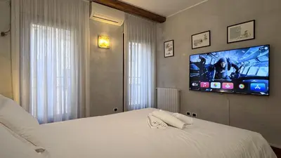 Letto o letti in una camera di Le Masque Terrace Prestige
