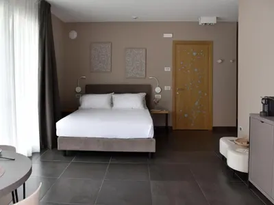 Letto o letti in una camera di Domus Natura