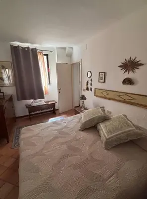 Letto o letti in una camera di Appartamento veneziano piano terra