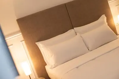 Letto o letti in una camera di Fenice Studios