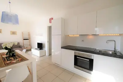 Cucina o angolo cottura di Residence Borgo Paradiso posto spiaggia compreso