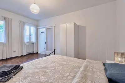 Letto o letti in una camera di City Retreat, Vicino alla Stazione di Padova