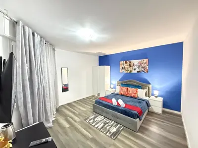 Letto o letti in una camera di Casa Raffinata