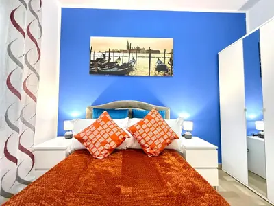 Letto o letti in una camera di Casa Raffinata