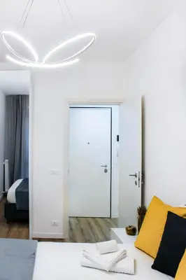 Letto o letti in una camera di Golden Nest Padova