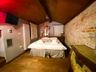 Letto o letti in una camera di Rosso Charm B&B