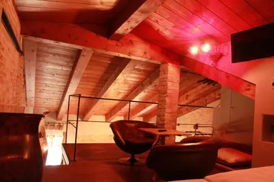TV o dispositivi per l'intrattenimento presso Rosso Charm B&B