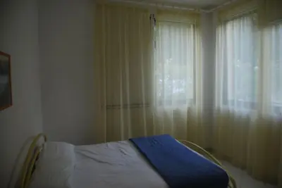 Letto o letti in una camera di Bright flat in Rosolina with shared pool