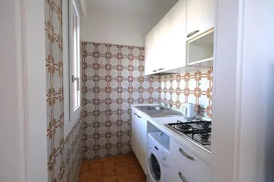 Cucina o angolo cottura di Trilocale Diplomatic Fronte Mare Piazza Torino