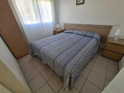 Letto o letti in una camera di Apartment in Rosolina Mare near beach