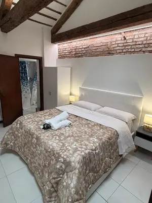 Letto o letti in una camera di Venice Mini Milky Way Apartment