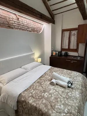 Letto o letti in una camera di Venice Mini Milky Way Apartment