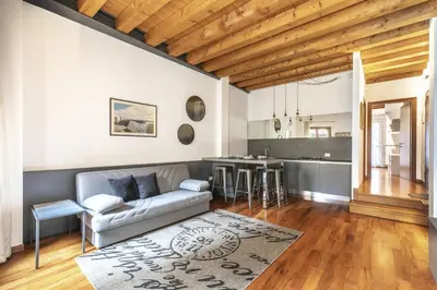 Area soggiorno di Squero Aptm by WelcHome
