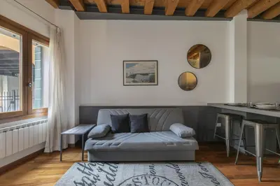 Area soggiorno di Squero Aptm by WelcHome