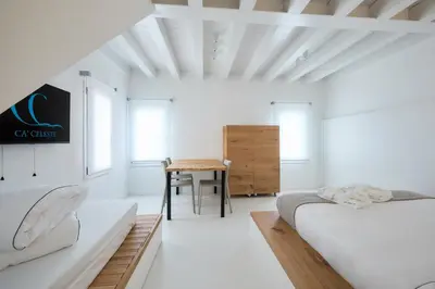 Letto o letti in una camera di Ca' Celeste